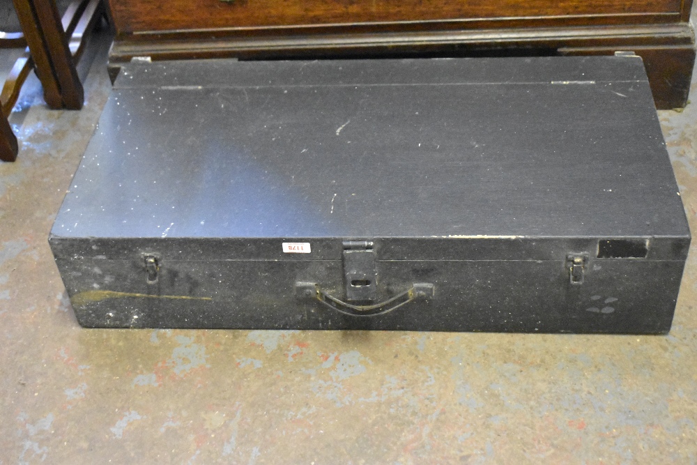 A black painted pine joiners toolbox, containing various tools.