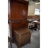 An early to mid 20th century walnut music cabinet with single drawer over two upboards. 69CM sold