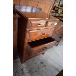 An early 20th century mahogany 2 / 3 chest of drawers, of small proportions with Bakelite type