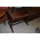 A Victorian mahogany sofa table, having reeded edge over demilune flaps and two drawers, all