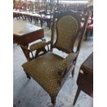 A late Victorian upholstered each chair, with stipple carved and arched crest-rail over the padded