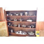 A Modern stained pine open bookcase, with four shelves 151CM. X. 153CM.