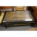 A 20th century imported wood coffee table, the centre panel slatted with bamboo. 120CM.