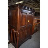 A 20th century stained mahogany television cabinet, in the 19th century style. 157CM. X 110CM.
