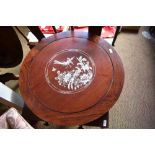 A 20th century Chinese Mother of Pearl inlaid hardwood lazy Susan, of circular form with central