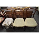 A group of three late Victorian single chairs, with moulded and carved decoration. Seat height.