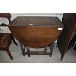 A 19th century oak dropleaf gateleg table, having single drawer over turned supports 79CM. X 83CM.