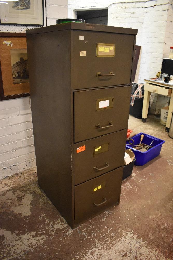 A mid century Sankey and Sheldon four drawer metal filing cabinet.