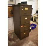 A mid century Sankey and Sheldon four drawer metal filing cabinet.