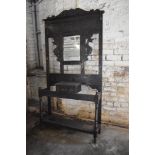 A Victorian carved and stained oak hall stand. 208CM.