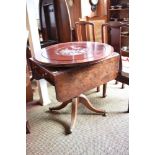 A Victorian mahogany pedestal Pembroke table, with reeded edge detail over single end drawer