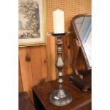A cast metal pricket candlestick, of traditional turned design. 51CM.