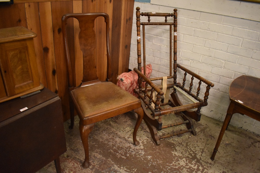 A Victorian American style rocking chair, having damage to panel and seat, sold together with a