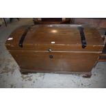 A large Dome topped grained pine blanket box, the top with painted strapwork design. The interior