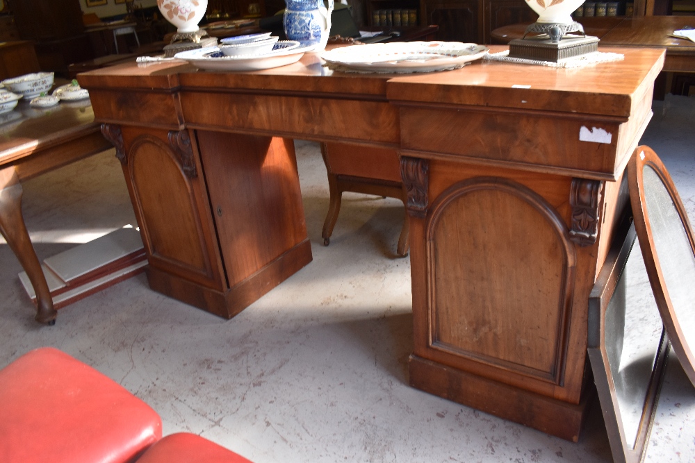 Victorian mahogany inverted breakfront pedestal sideboard, possibly Scottish, the pedestals with