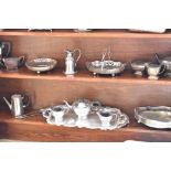 A selection of silver plated wares to include three piece tea sets, fruit baskets.