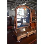 A Victorian figured walnut swing dressing mirror. 66CM.