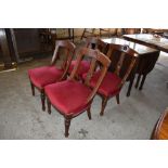 An early 20th century mahogany dropleaf dining table 76 90CM. Sold with a set of four late Victorian