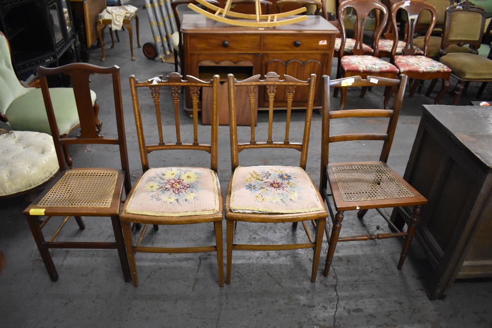 Two pairs of Edwardian bedroom chairs, one pair with inlaid banding, the other with caned seats