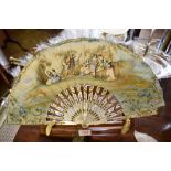 A 19th century mother of Pearl fan the concertina paper leaf, with ostrich feather trim, hand
