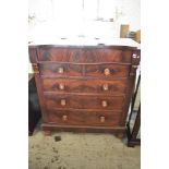 A Victorian figured mahogany chest of drawers, the serpentine top over a blind frieze drawer and