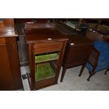 An Edwardian glazed music cabinet of traditional design sold together with an Edwardian mahogany