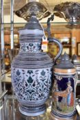 A large modern Rhenish pottery style stein, 37 CM sold together with a smaller German stein and