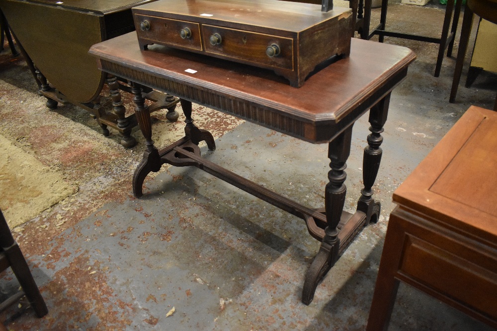 Victorian mahogany side table, of canted rectangular form with moulded edge detail and double turned