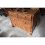An Edwardian inlaid mahogany chest of 2 / 3 drawers, the drawers with inlaid geometric banding and