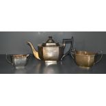 A 1930's silver three piece teaset, of canted rectangular form with angular handles, marks for