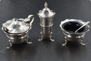 A silver three piece condiment set, of traditional design, marks for Birmingham 1907/08, maker