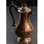 An Edwardian silver hotwater pot, of baluster form with domed finial topped cover over shallow