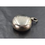 A silver plated sovereign case, of hinged circular form with sprung interior, 4cm. Some losses to