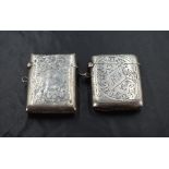 A George V silver vesta case, of hinged rectangular form, curved for the gentleman's pocket and