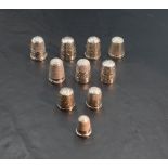 Nine hallmarked silver thimbles of various dates and forms including Charles Horner and a DORCAS