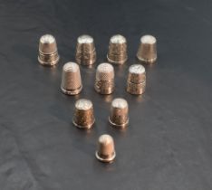 Nine hallmarked silver thimbles of various dates and forms including Charles Horner and a DORCAS