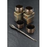 Two pairs of silver napkin rings including foliate engraved with monogrammed cartouche, Chester