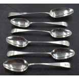 A group of five George III silver Old English pattern dessert spoons, each with Hanovarian