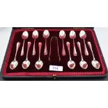 A cased set of twelve late Victorian teaspoons & sugar tongs, Hanovarian varient with rat tail