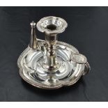 A Victorian silver chamber stick, of lobed circular form with bead moulded edge detail, having a