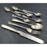 A group of mixed silver flatware and cutlery, comprising a set of six Kings pattern coffee spoons,