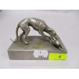An Art Deco cast metal study of a greyhound with rabbit in mouth.