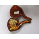 A 1930s carved Meerschaum pipe having HF silver marked to cuff of pipe, in original case.