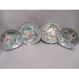 Two plates and two bowls having oriental design with key motif to borders, around late 19th early