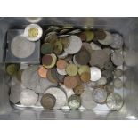 A mid century sandwich tin containing assorted collectable coins.