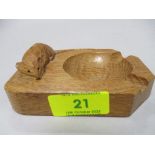 An oak ashtray in the Robert Thompson style, with carved mouse to side.