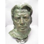 A substantial vintage cast metal bronze effect bust of a gentleman on stand.