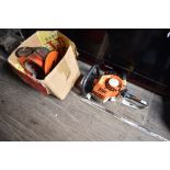 A Stihl hedge trimmer and accesories