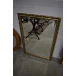 A modern gilt framed mirror