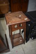 A late 19th or early 20th Century oak plant stand